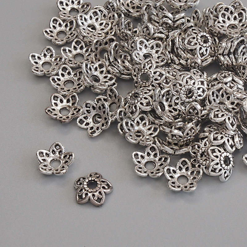 Čepičky na korálky, stříbrná barva, průměr 7,5×1 mm, otvor 1,8 mm, balení 20 g (~91 ks)