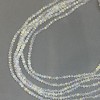 Korálky z českého křišťálu na vlascu bílé průhledné s benzínovým nástřikem, brusované rondely, průměr 3,5×3 mm, délka 33 cm