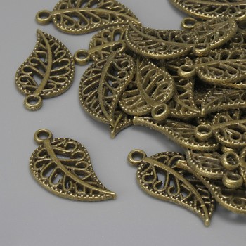 Přívěšek List bronzové barvy, průměr 18×10 mm ± otvor 1,5 mm ± balení 27 ks