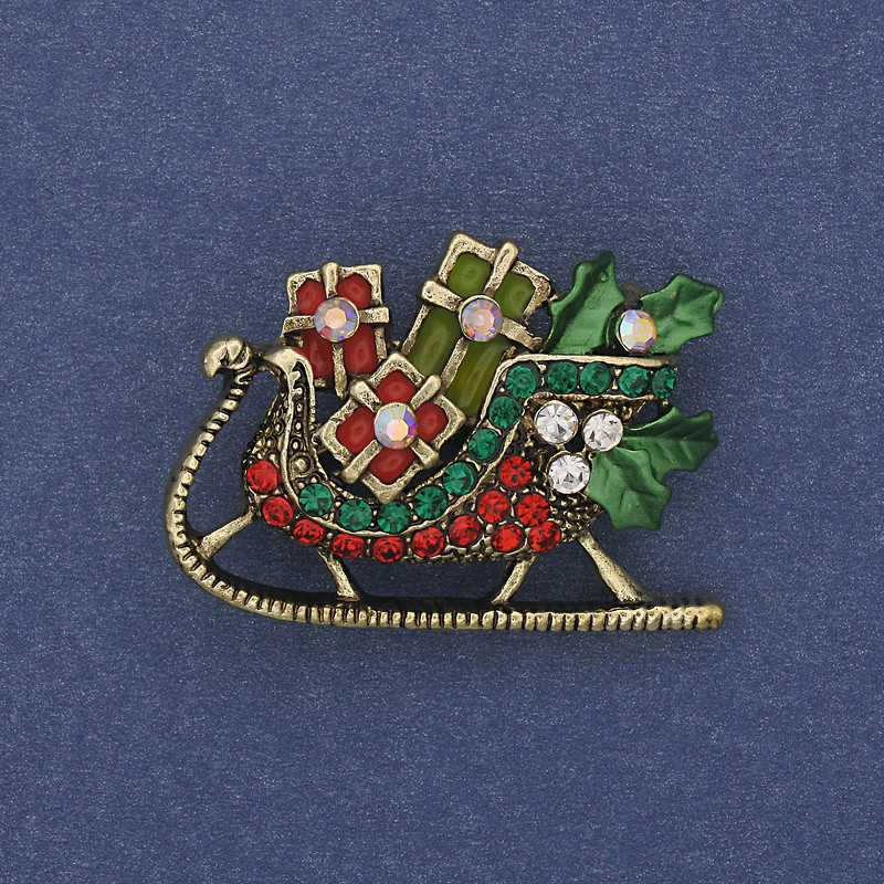 Brož «Novoroční saně» se smaltem a štrasovými kamínky, zlatý kov, 35×24 mm +