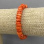 Náramek z oranžového korálu, korálové rondely, průměr cca 9×4–4,5 mm, délka 18 cm, elastický