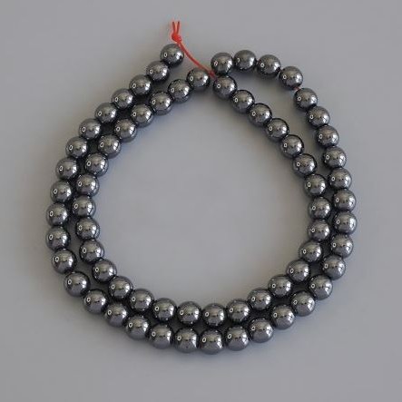 Korálky hematitu – kuličky 6 mm ± na šňůrce, délka 40 cm ±