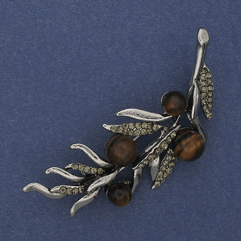 Brož Větvička tygří oko, šedé štrasové kamínky, 67×26 mm, stříbřitý kov