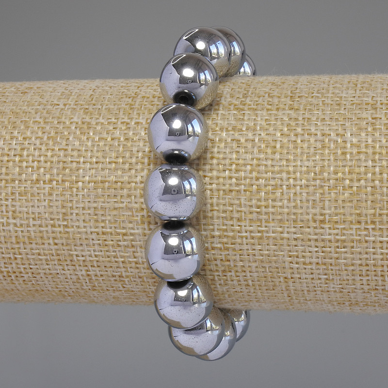 Náramek z hematitu, stříbrná barva, hladké kuličky, průměr 12 mm, délka 18 cm, elastický