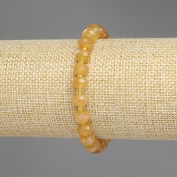 Náramek z facetovaného citrínu rondelového tvaru, průměr cca 8×5 mm, rokajly 3 mm, délka 18 cm, elastický