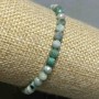 Náramek ze smaragdu, brusované kuličky, průměr 5 mm, délka 18 cm, elastický
