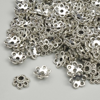 Čepička na korálek, průměr 7 mm ±, otvor 1,9 mm ±, stříbrná barva kovu balení 20 g ± (~125 ks)