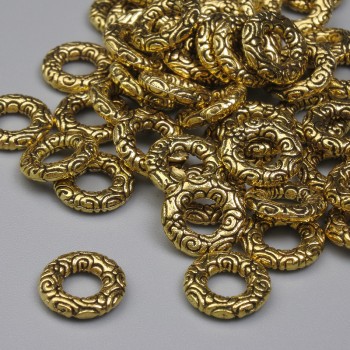Kovová komponenta – korálka-vložka, barva kovu: zlato, průměr 8,5×2 mm, otvor 3,5 mm, balení 20 g (~50 ks)