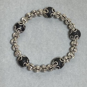 Náramek z lávy s kovovými vložkami