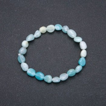Браслет із натурального каменю Аквамарин на резинці галтування, діаметр 7х9(+-)мм обхват 18см