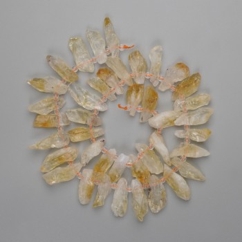 Korálky z nerafinovaného citrínu, 20–23×7–9 mm + korálky 3 mm +-, délka 40 cm