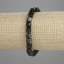 Náramek ze stříbrného obsidiánu, brusované kostky, rozměr 6×6 mm, délka 18 cm ±, na elastické šňůře