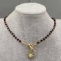 Choker z granátu a hematitu s broušenými kuličkami 4 mm ±, hematitovými kuličkami 2 mm ±, s přívěskem Slunce 20 mm ±, délka 37 cm ±, zapínání typu toggle