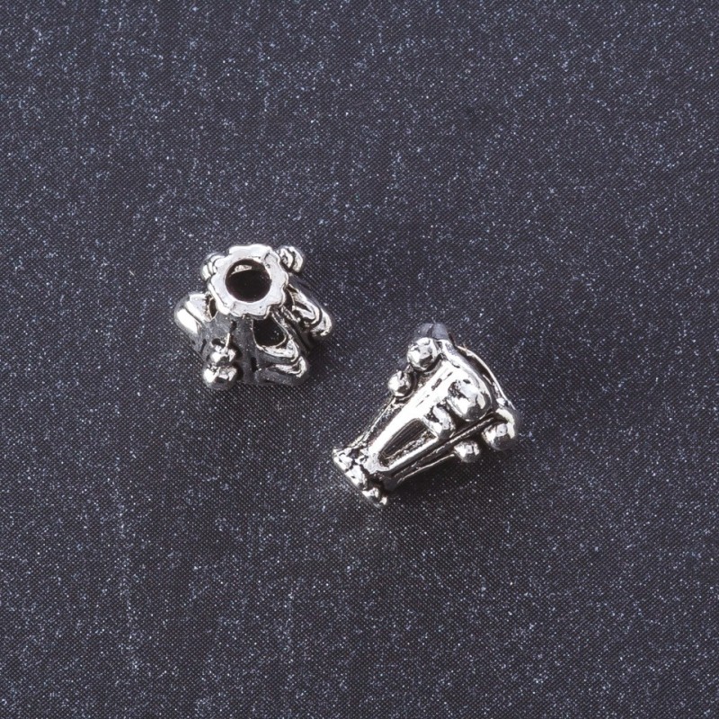 Koncovka, barva kovu „stříbro“, délka 10 mm, balení 20 g ± 24 ks