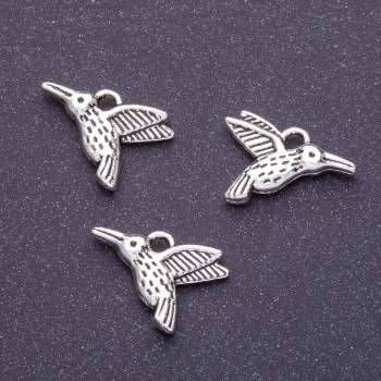 Přívěšek kolibřík, délka 11×16 mm Ø 1 mm, fas. 20 g ± 13 ks