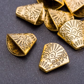 Koncovka na korálky ve odstínu staré zlato, rozměry 18×19×7 mm, otvor 5 mm, balení 20 g, +/- 6 ks