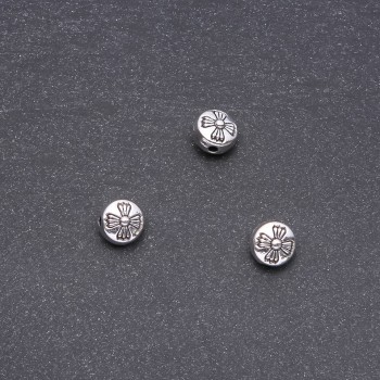 Kovová součástka – korálka-vložka ve tvaru kříže 8 mm, balení 20 g, ±17 ks