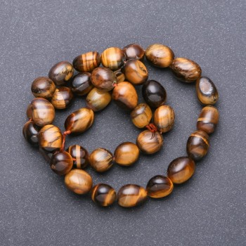 Brusované korálky tygřího oka na niti, průměr 9–12×8 mm, délka 38 cm