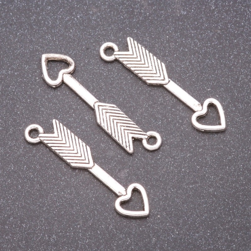 Přívěsek-konektor Šíp, průměr 30×7 mm, průměr in-1, 7 mm fas. 20 g ± 19 ks