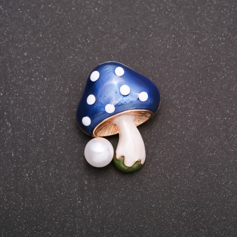 Brož Muchomůrka 29 × 22 mm – modrý smalt na žlutém kovu