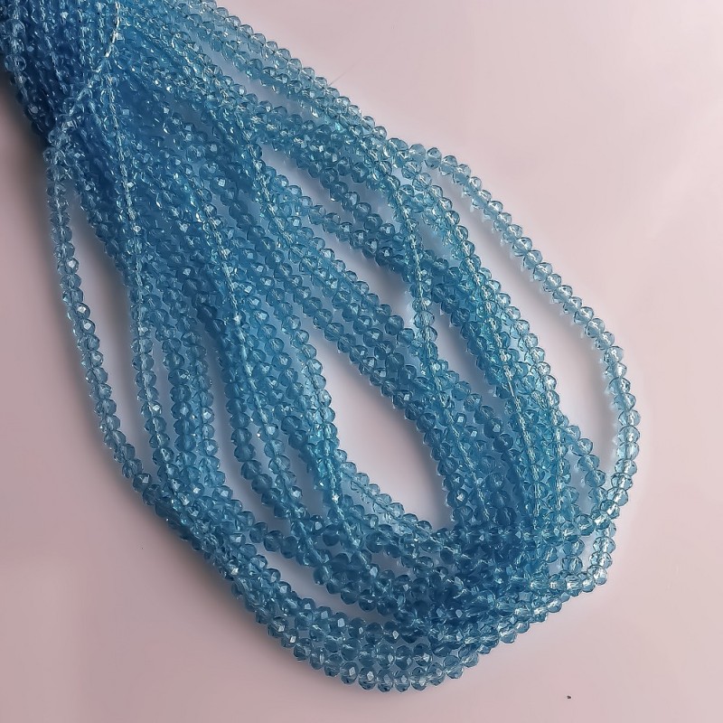 Korálky Český křišťál průhledně světle modré rondelové, průměr 3,5×2,5 mm, délka nitě cca 40 cm