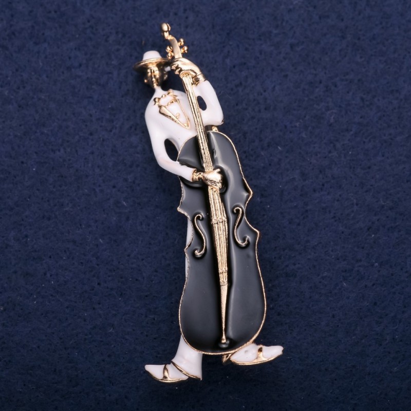 Brož Muzikant, bílá a černá smalt, 67×26 mm, žlutý kov