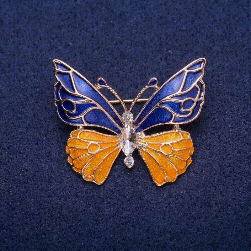 Brož Motýl modro-žlutá smaltovaná, bílý krystal, zlatý kov 30×36 mm