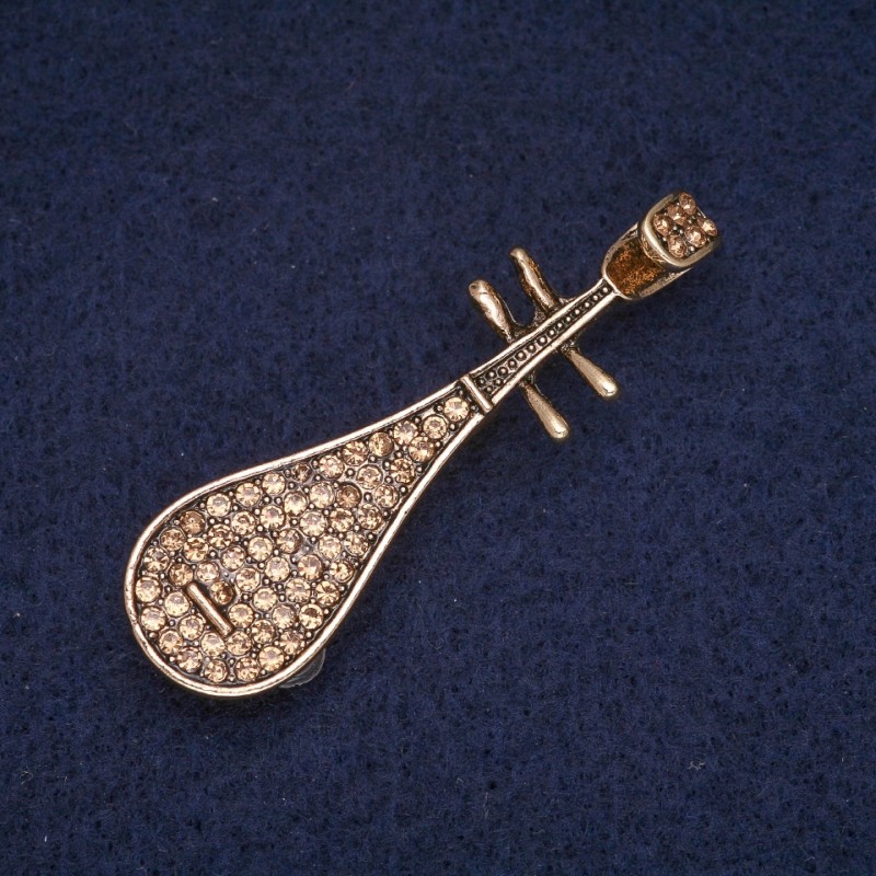 Brož Pipa se žlutými štrasovými kameny, zlatavý kov 15×50 mm