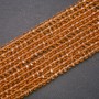 Korálky Český křišťál, průhledný jantarový odstín, tvar rondelu, průměr 6×4,5 mm, na niti, délka 38 cm