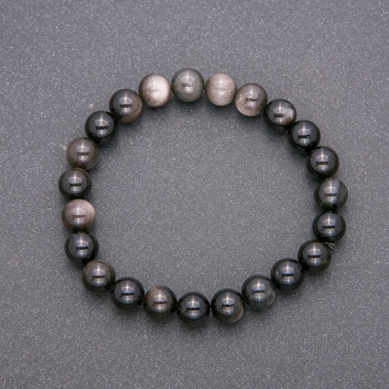 Náramek z přírodního kamene – obsidián, stříbřitý, na gumičce, hladká kulička, průměr cca 8 mm, délka 18 cm