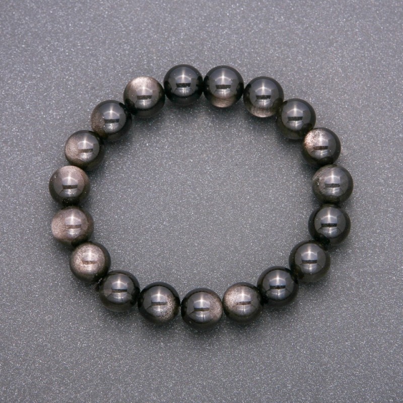 Náramek z přírodního kamene – stříbrný obsidián na gumičce, hladké korálky, průměr cca 10 mm, délka 18 cm