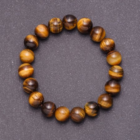 Náramek z přírodního kamene tygří oko na gumičce, průměr 10 mm, obvod 18 cm