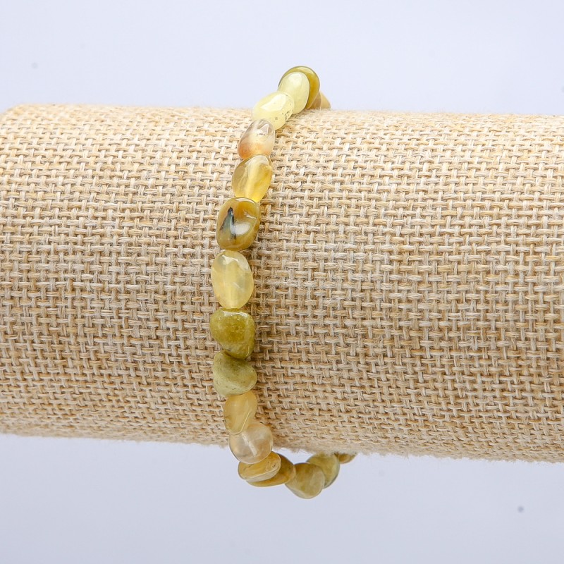 Náramek z žlutého opálu na gumičce, facetovaný výbrus, průměr 7×6 mm, délka 18 cm