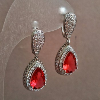 Náušnice Xuping rhodium s bílými kamínky a červeným krystalem, rozměry 35×14 mm +