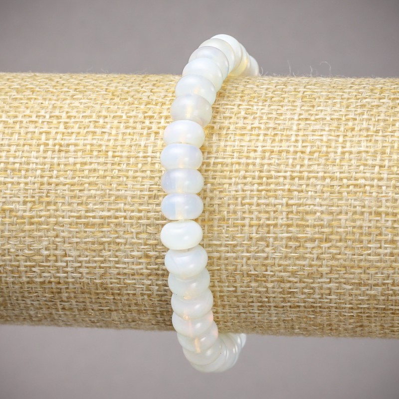 Náramek na gumičce z měsíčního kamene (syntetický) hladké rondely, průměr 8×5 mm, délka 18 cm