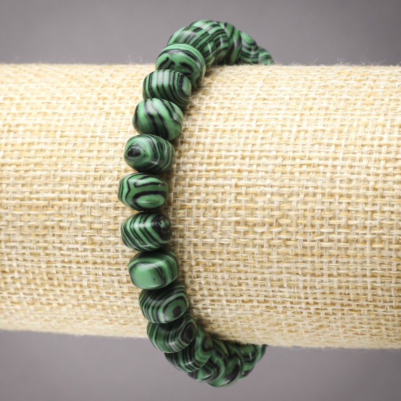 Náramek z malachitu na gumičce, hladké rondely, průměr 9×7 mm