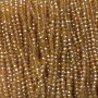 Korálky Český křišťál na niti oranžovo-meruňkové průhledné s benzínovým leskem, fasetovaný rondel, průměr 3,5×3 mm ±, délka 36–38 cm