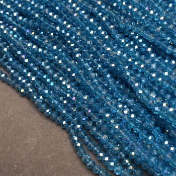 Korálky Český křišťál na niti modro-zelené průhledné s broušeným rondelem, průměr 3,5×3 mm + -, délka 36–38 cm +