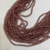 Korálky z Českého křišťálu na niti, světle hnědé průhledné, brusovaný rondel, průměr 3,5×3 mm, délka 33 cm