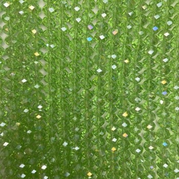 Korálky českého křišťálu na vlascu světle zelené průhledné s benzínovým leskem, broušené rondely, průměr 8×6,5 mm, délka 40-4