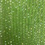 Korálky českého křišťálu na vlascu světle zelené průhledné s benzínovým leskem, broušené rondely, průměr 8×6,5 mm, délka 40-4