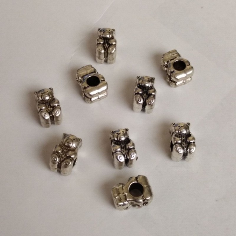 Korálky Myška, průměr 14×8 mm ±, vnitřní otvor 5 mm ±, stříbrný kov (balení 9 ks)