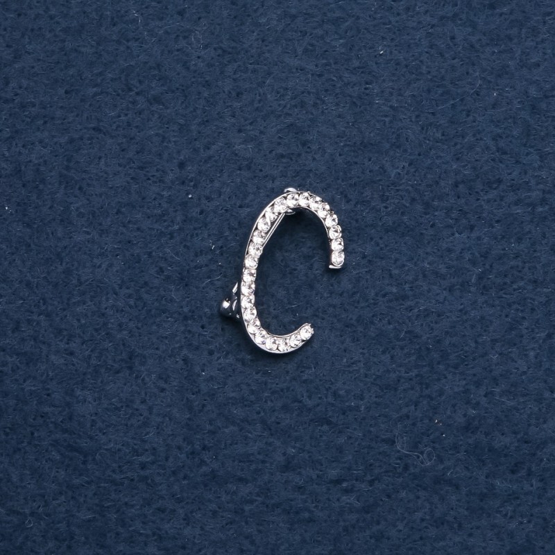 Brož iniciál „S“ 26×18 mm, barva kovu „stříbro“