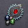 Brož «Řád krásy» s různobarevnými krystaly 60 × 38 mm žlutý kov