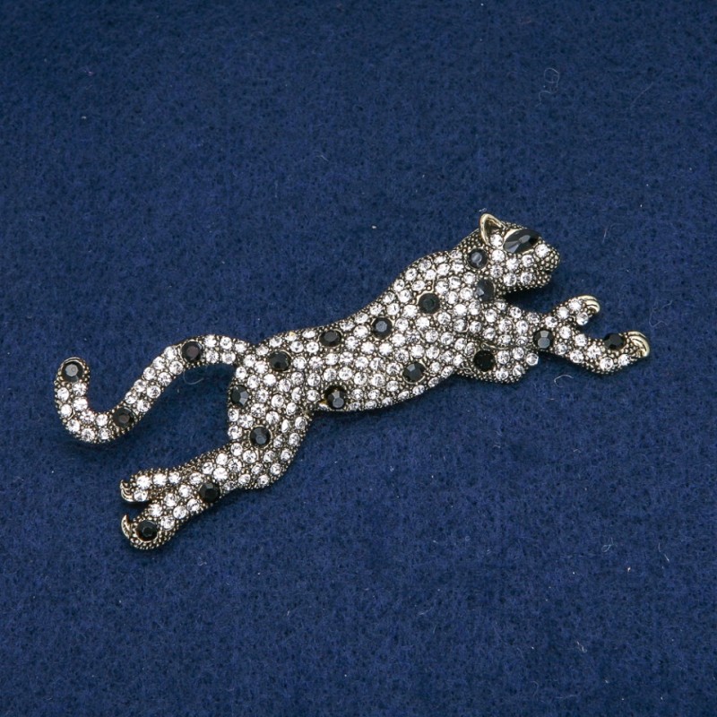 Brož s leopardím vzorem – bílé a černé krystaly, stříbrný kov 78×30 mm +