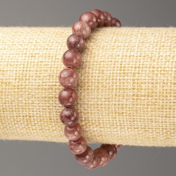 Náramek ze syntetického akrylu napodobující selenit, průměr kuliček 8 mm ±, délka 18 cm ±, hladké kuličky na gumičce