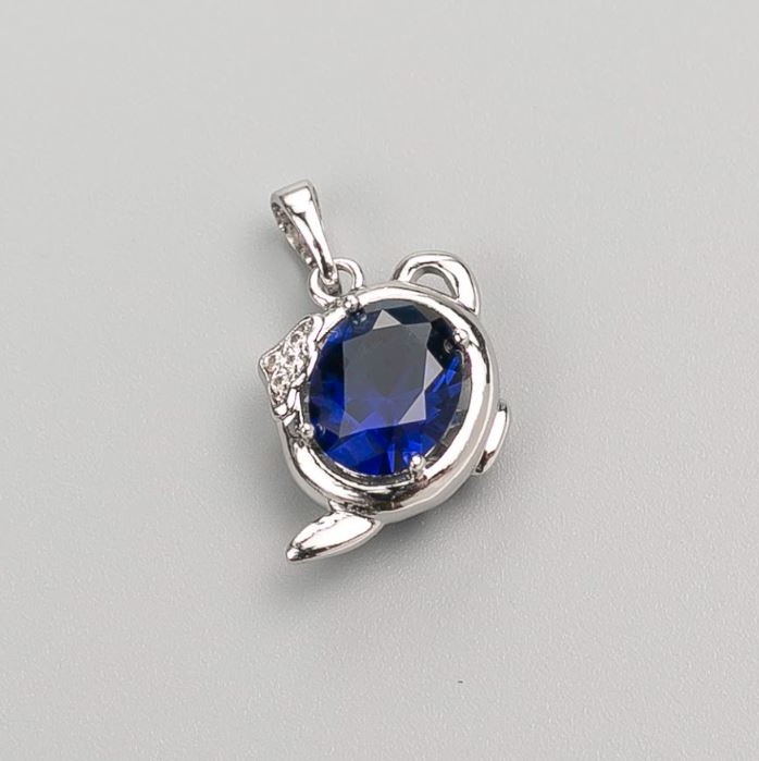 Přívěsek Xuping se modrým kamenem 20×14 mm Rhodiovaný