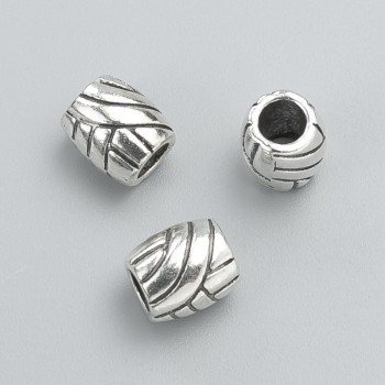 Kovová korálka-vložka, průměr 9×8 mm, balení 12 ks ±, barva kovu 'stříbro'