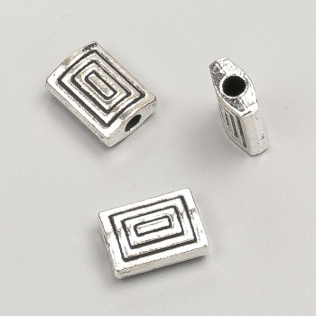 Kovová korálka-vložka, průměr 12×8×4 mm, balení 20 g, 12 ks ±, barva kovu "stříbro"