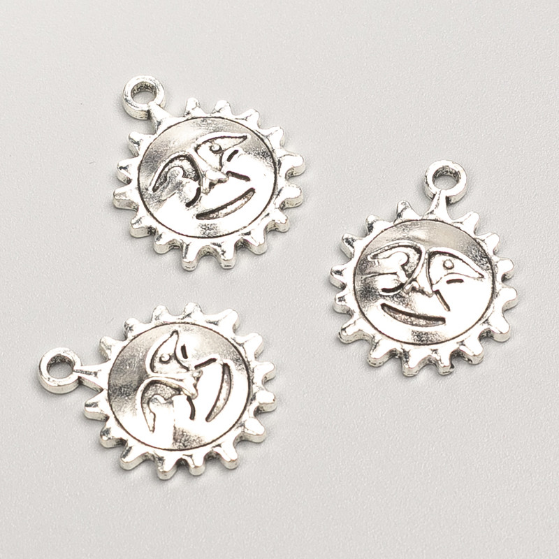 Přívěsek Slunce, rozměry 21×16×3 mm, balení 11 ks, hmotnost 20 g
